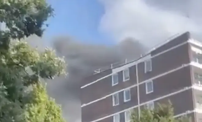 The blaze tore through a 10th-floor flat